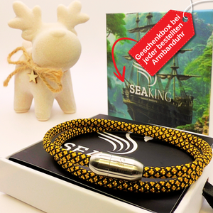 Armband SeaKing XMAS Edition – maritimes Armband in Gold-Schwarz mit Geschenkverpackung und Rentierfigur